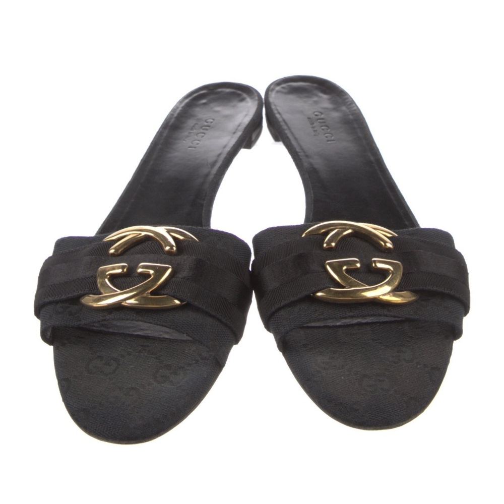 GUCCI BLACK & GOLD GG LOGO FLATS; Blondie cloth sandal
